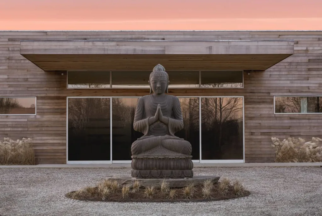 Buddha at Shou Sugi Ban House luxury wellness retreat East Coast